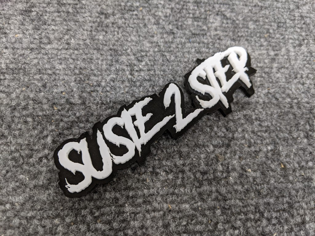 Susie 2 Step Car Badge - White on Gloss Black - Aggressive Font - Atomic Car Concepts