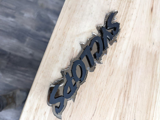 Syclops Car Badge - Matte Black On Mirror Bronze - Lightning Font - Atomic Car Concepts