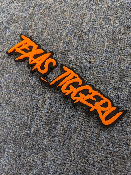 Texas_Tiggeru Car Badge - Orange On Gloss Black - Aggressive Font - Atomic Car Concepts