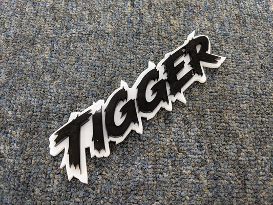 Tigger Car Badge - Gloss Black on White - Lightning Font - Tape Mounting - Atomic Car Concepts