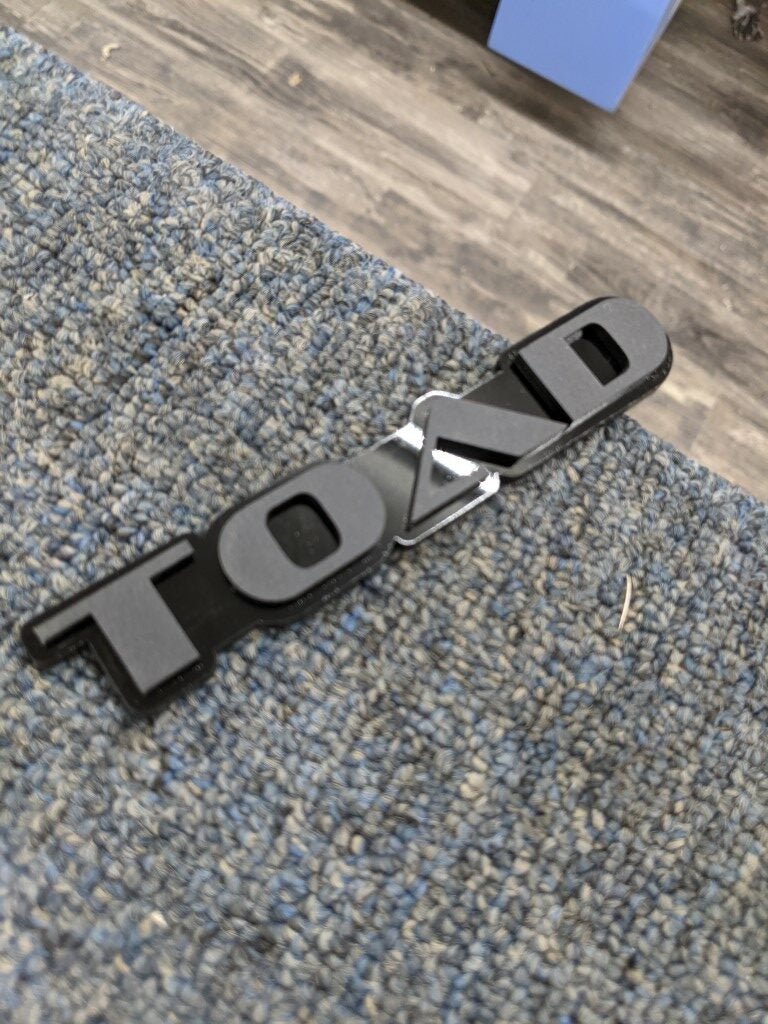 Toad Car Badge - Matte Black On Gloss Black - OEM Font - Atomic Car Concepts