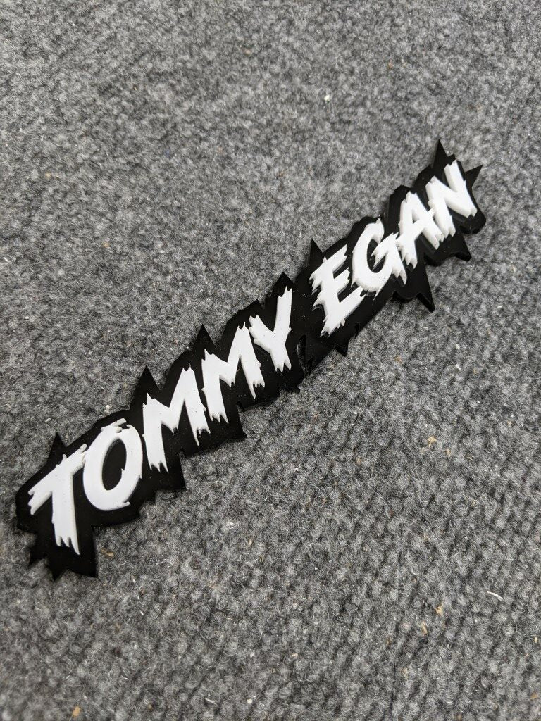 Tommy Ragen Sticker Tommy Egan Car Badge - White on Black โ Atomic Car Concepts