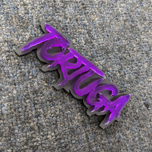 Tortuga Car Badge - Mirror Purple on Matte Black - Aggressive Font - Tape Mounting - Atomic Car Concepts