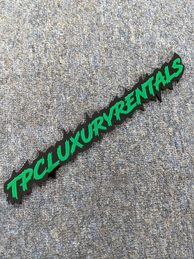 TPC Luxury Rentals Car Badge - Green on Gloss Black - Lightning Font - Tape Mounting - Atomic Car Concepts