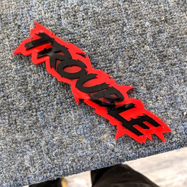 Trouble Car Badge - Gloss Black On Red - Lightning Font - Atomic Car Concepts