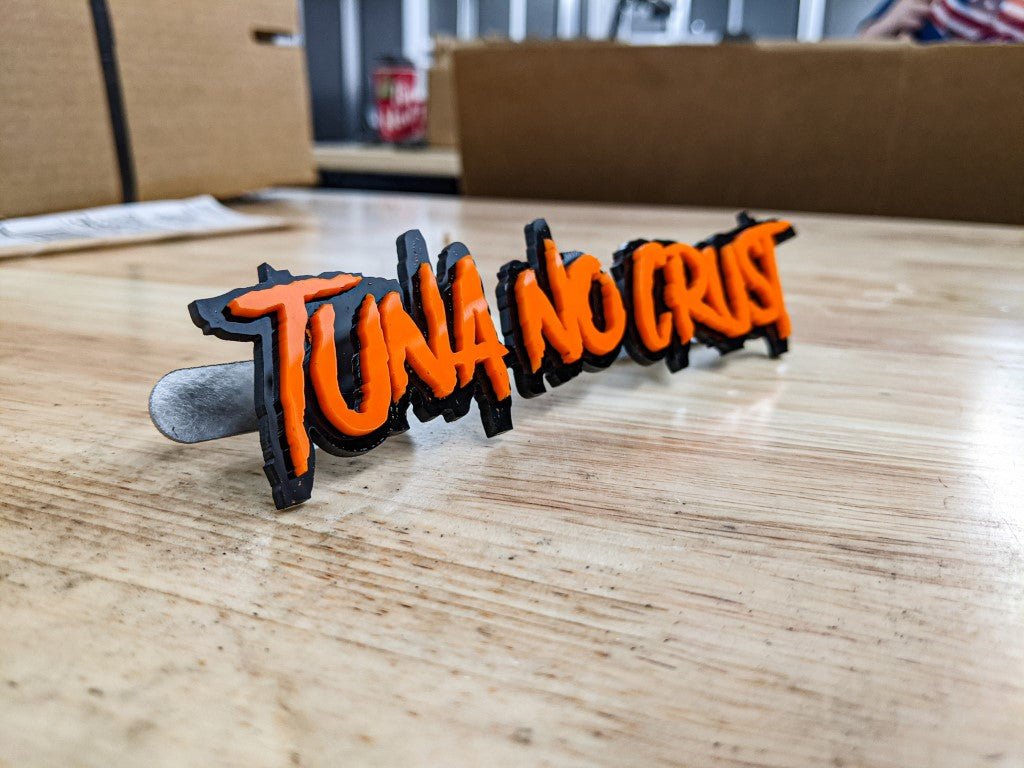 Tuna No Crust Car Badge - Orange on Gloss Black - Aggressive Font - Tape Mounting - Atomic Car Concepts