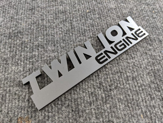 Twin Ion Engine Badge - Black and Brushed - Atomic Car Concepts