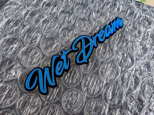 Wet Dream Car Badge - Mirror Blue On Gloss Black - Script Font - Atomic Car Concepts