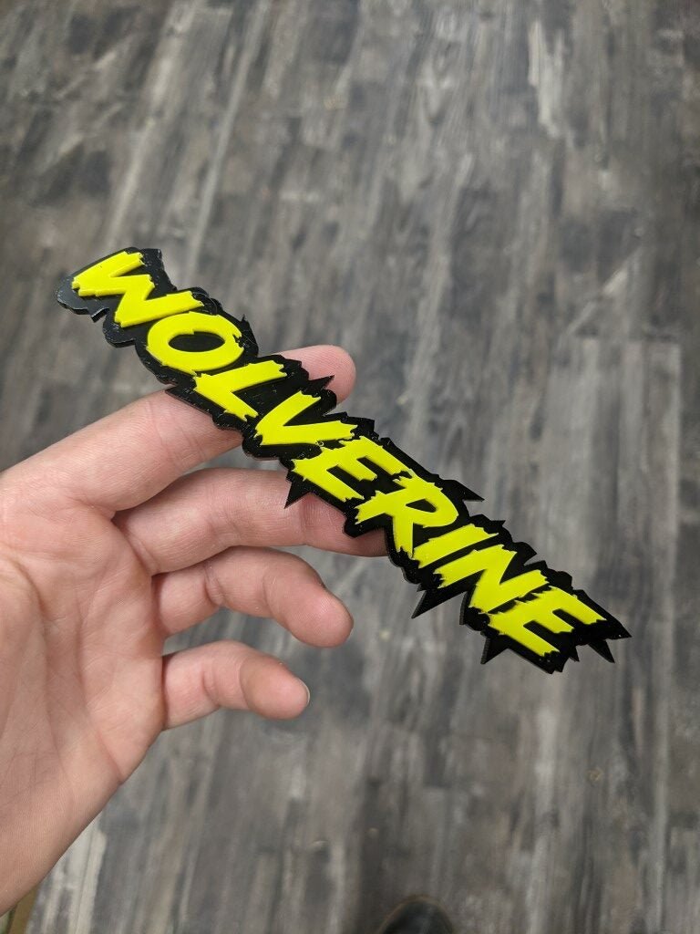 Wolverine Car Badge - Yellow On Gloss Black - Lightning Font - Atomic Car Concepts