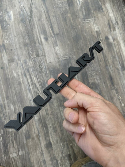 Yautjart Car Badge - Matte Black On Matte Black - OEM Font - Atomic Car Concepts